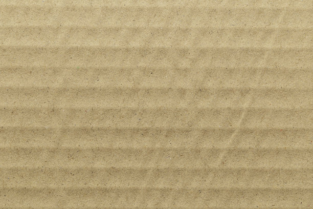 棕色生态再生牛皮纸片纹理纸板背景。图片下载