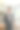 一个聪明的亚洲商人站在办公室里一边看文件一边喝咖啡。图片下载
