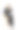 一位身穿黑色西装、面带微笑的女士拿着一本杂志坐在椅子上。图片下载