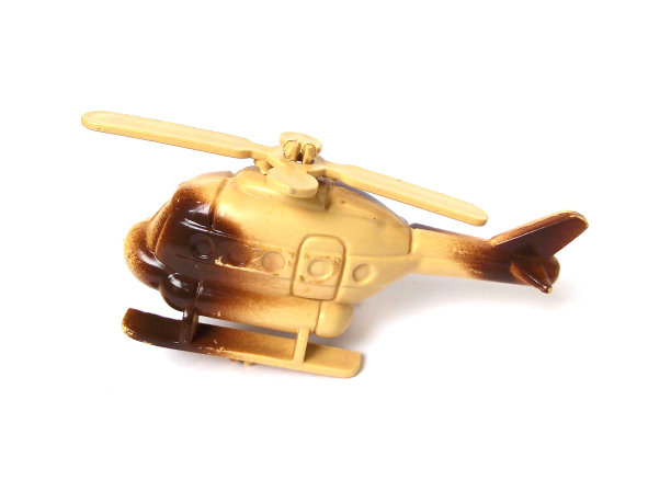 直升机玩具的特写，孤立在白色背景上。图片下载