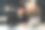 年轻的亚洲商人晚上在黑暗的办公室里用笔记本电脑工作。迷人英俊的印度男人在深夜带着落地灯的温暖灯光在家里努力加班图片下载