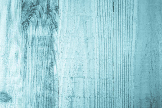 旧垃圾木板纹理背景。古色古香的蓝色木板墙有古色古香的开裂风格，家具的背景对象设计为薄荷绿色。油漆风化剥落的餐桌硬木。图片下载