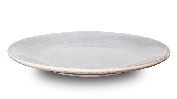 白色背景上隔离的灰圈陶瓷板。图片下载