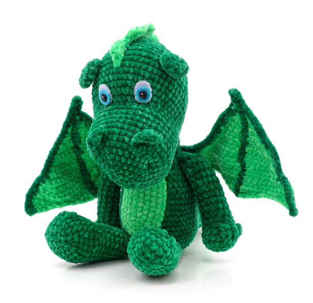 绿色针织龙玩具。图片下载