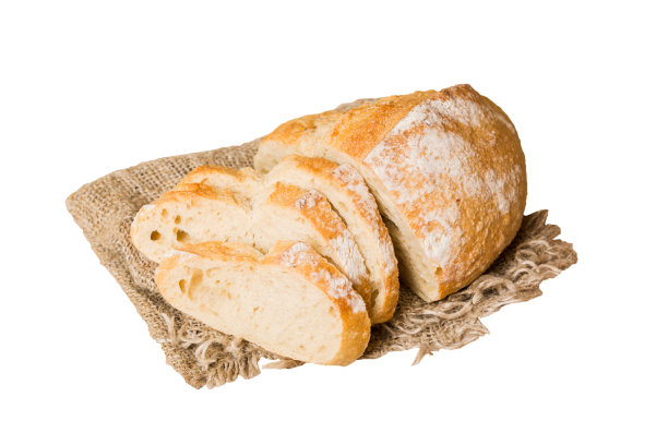 各种各样的新鲜切片烤面包与餐巾隔离在白色背景。健康的无酵面包。法式面包片图片下载