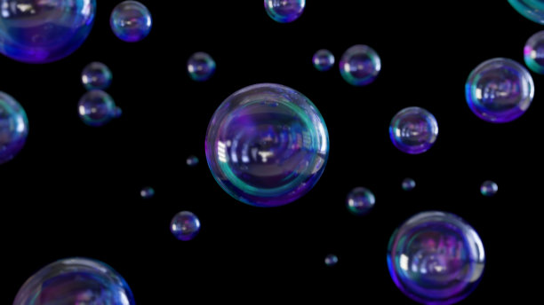 一个微距镜头的许多水泡上升在一个黑色的背景。图片下载