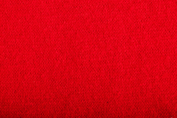 缝纫用红色羊毛织物。纺织品的背景。图片下载