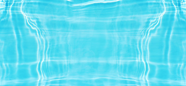 蓝蓝的水面上泛起涟漪。散焦模糊透明蓝色透明平静水面纹理与飞溅和气泡。水波与闪亮的图案纹理背景。图片下载