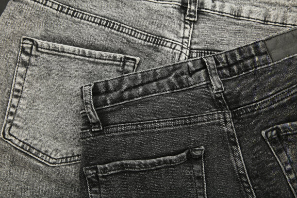 特写灰色和黑色牛仔裤细节，高分辨率纹理图片下载