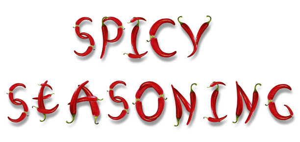 辣椒可编辑的字母-辛辣的调味料，在一个孤立的白色背景图片下载