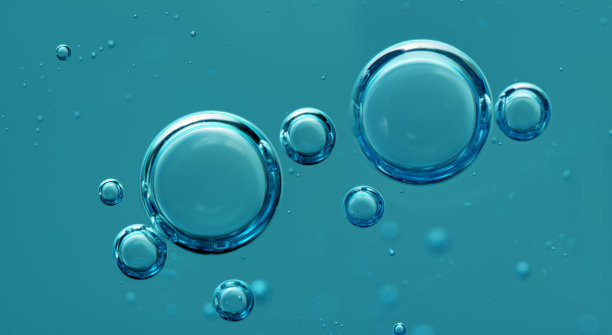 绿松石液体中的气泡。抽象的水背景。水下结构。宏图片下载