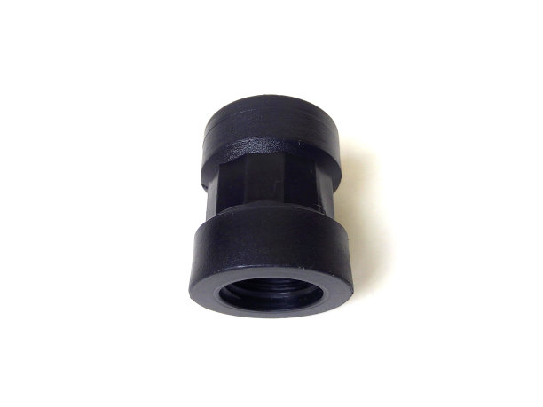 白色背景上黑色塑料管件的特写。图片下载