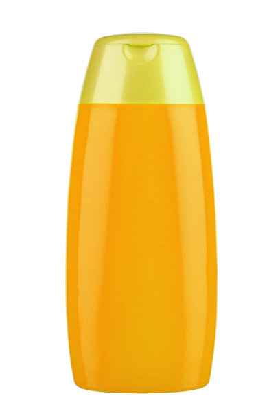 白色背景上的黄色洗发水瓶。为您的设计做好准备。图片下载