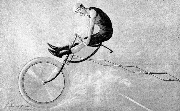 单轮自行车和支撑轮在远处图片下载