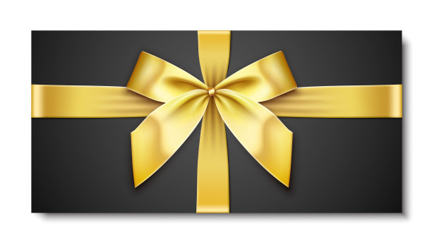 黑色礼盒与金色蝴蝶结和丝带图片下载