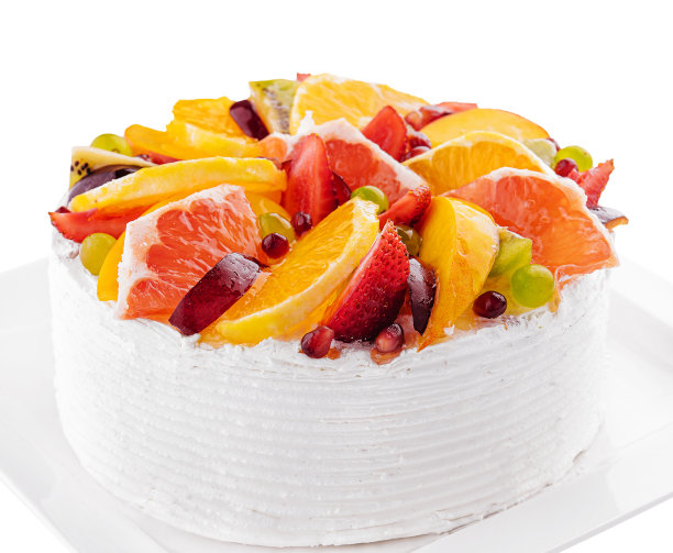 白色盘子里美味的水果慕斯蛋糕图片下载