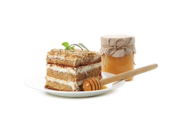 糖果的概念，蜂蜜蛋糕，孤立在白色的背景图片下载