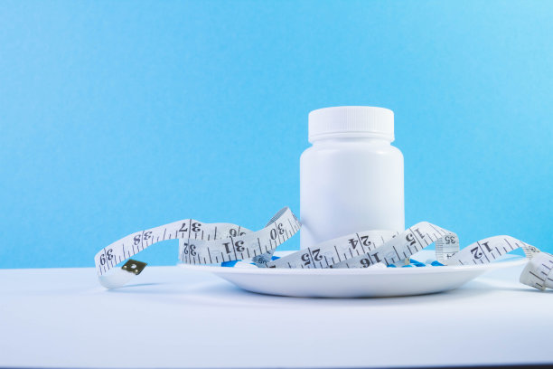 减肥药丸。肥胖症的治疗。超重的问题。图片下载