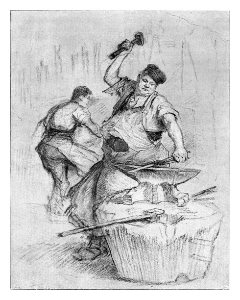 铁匠在铁砧上加工铁器图片下载