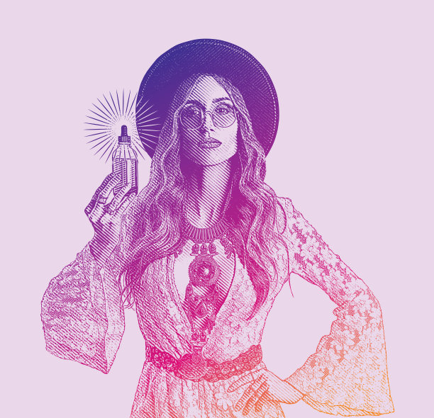 拿着一瓶CBD油的波西米亚女人图片下载