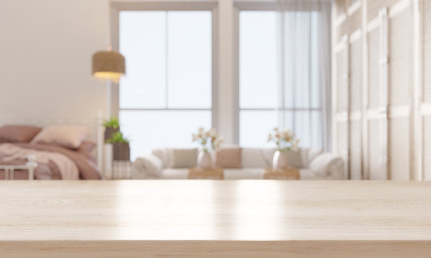 空的木制桌面上放着沙发和床。图片下载