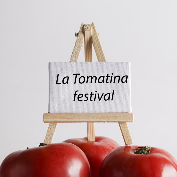 番茄节写在白板上，白底红番茄。西班牙Bunyol村著名的番茄大战概念。广场图片下载