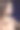 美丽的黑发女人肖像在黑色背景和孔雀羽毛耳环图片下载