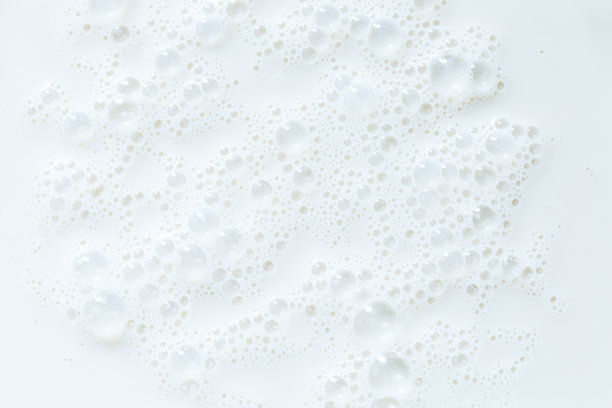 宏观牛奶纹理，高分辨率美丽的天然牛奶飞溅可以作为背景。图片下载