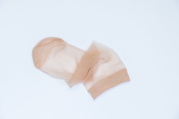 彩色背景上的女性尼龙紧身衣特写图片下载