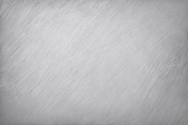 旧铝金属纹理与划痕为背景。图片下载