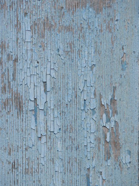 复古的木制背景-一个古老的风化的木板漆成蓝绿色粉彩与剥落的油漆图片下载