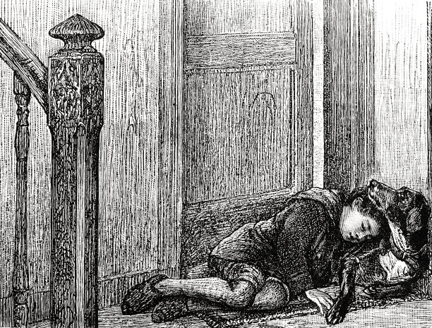 男孩睡在门外，用一只狗做枕头图片下载