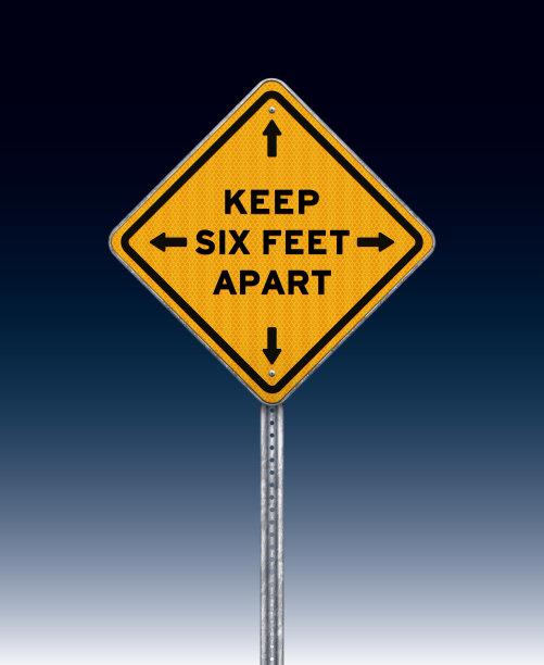 黑色背景上的黄色社交距离警告标志图片下载