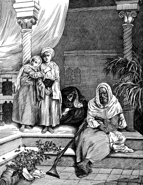 一名男子在摩洛哥放松和抽烟斗- 18世纪图片下载