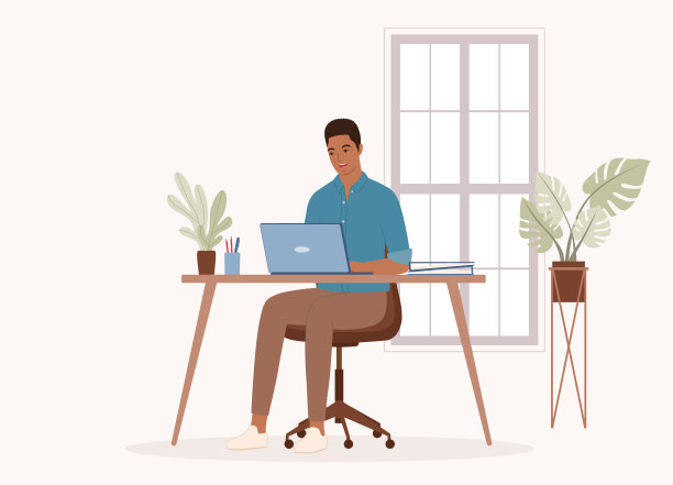 年轻黑人在办公室用笔记本电脑工作。图片下载