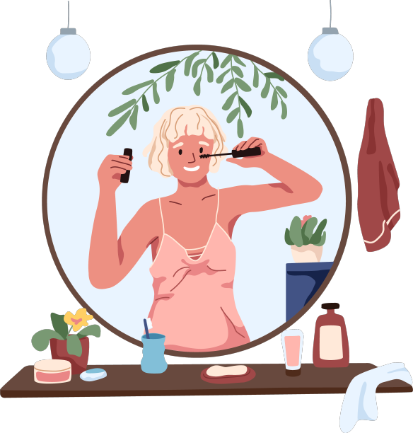 年轻女子正对着镜子画眼妆图片下载