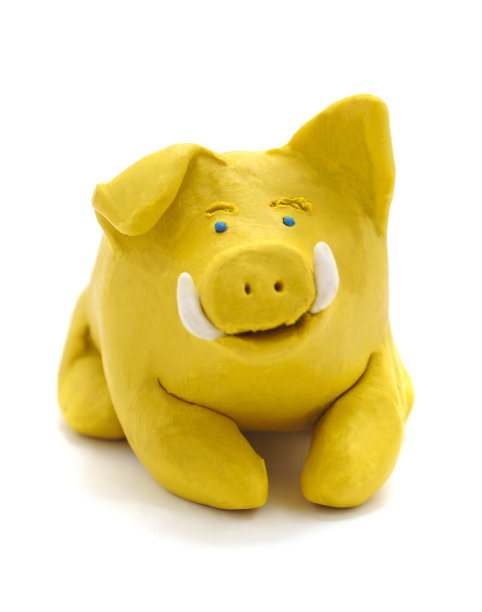 黄色橡皮泥猪。图片下载