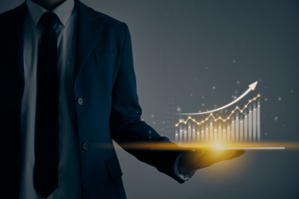 商人持有平板电脑和股票市场条形图或图表趋势复古色调图片下载