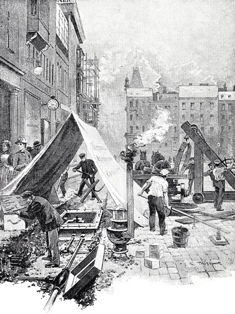 在城市街道上创建地下电缆网络图片下载