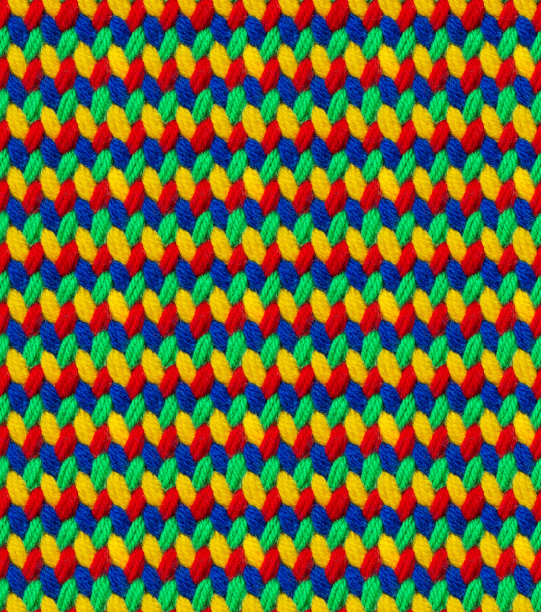 无缝针织图案钩针从明亮的腈纶纱。以多色针脚的形式编织。图片下载