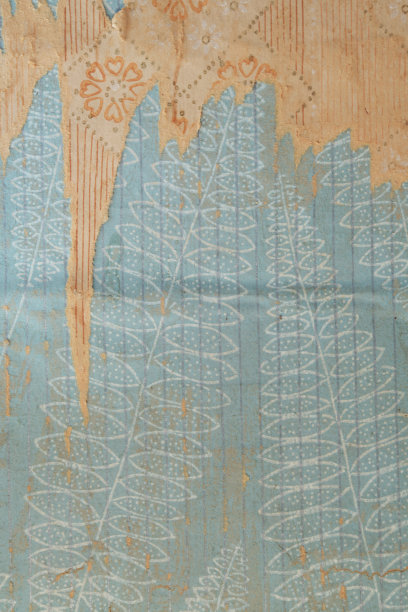 墙上的旧墙纸。旧的撕破的墙纸作为纹理或背景。图片下载