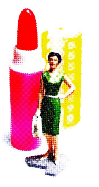 用口红和卷发棒的女人图片下载