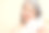 抗老化抗皱美容化妆品。美化和复兴。特写照片的成熟中年妇女拿着兰花花在她的脸上，眼睛闭着图片下载