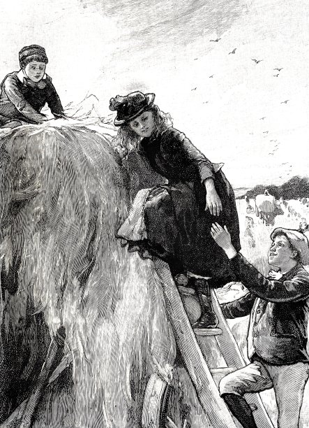 孩子们通过梯子爬上装满干草的马车图片下载