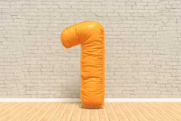 房间里的1号气球，砖墙背景图片下载