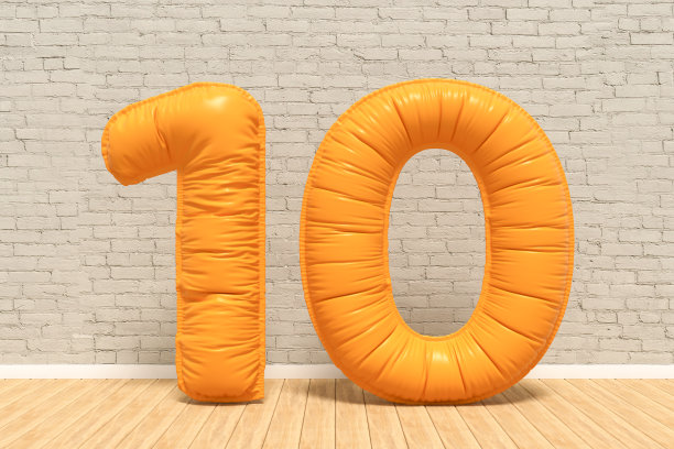 房间里的10号气球，砖墙背景图片下载