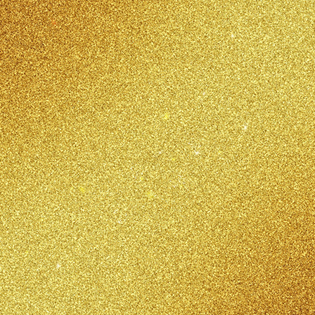 金色闪闪发光的背景纹理。闪闪发光的节日背景豪华礼品卡或假期圣诞背景。闪闪发光的金色彩纸装饰设计为优质的设计图片下载