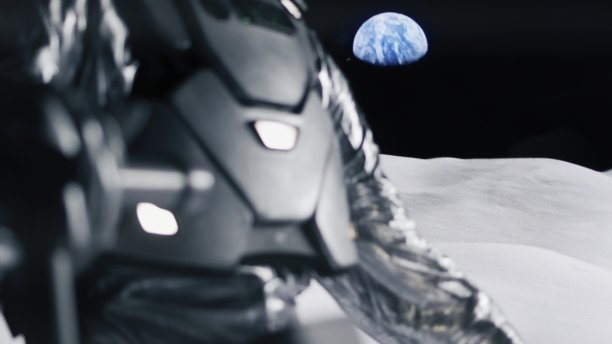 月球车在月球表面旅行。宇航员与遥远的地球在天空中图片下载