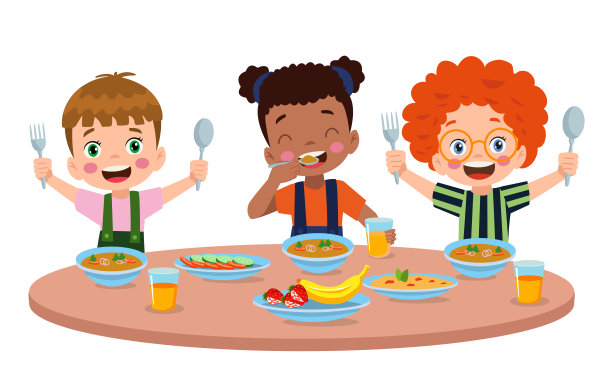 男孩和女孩在餐桌上吃饭图片下载