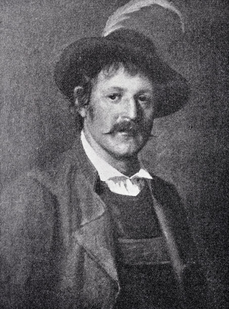 来自蒂罗尔的年轻人，戴着帽子，留着胡子图片下载